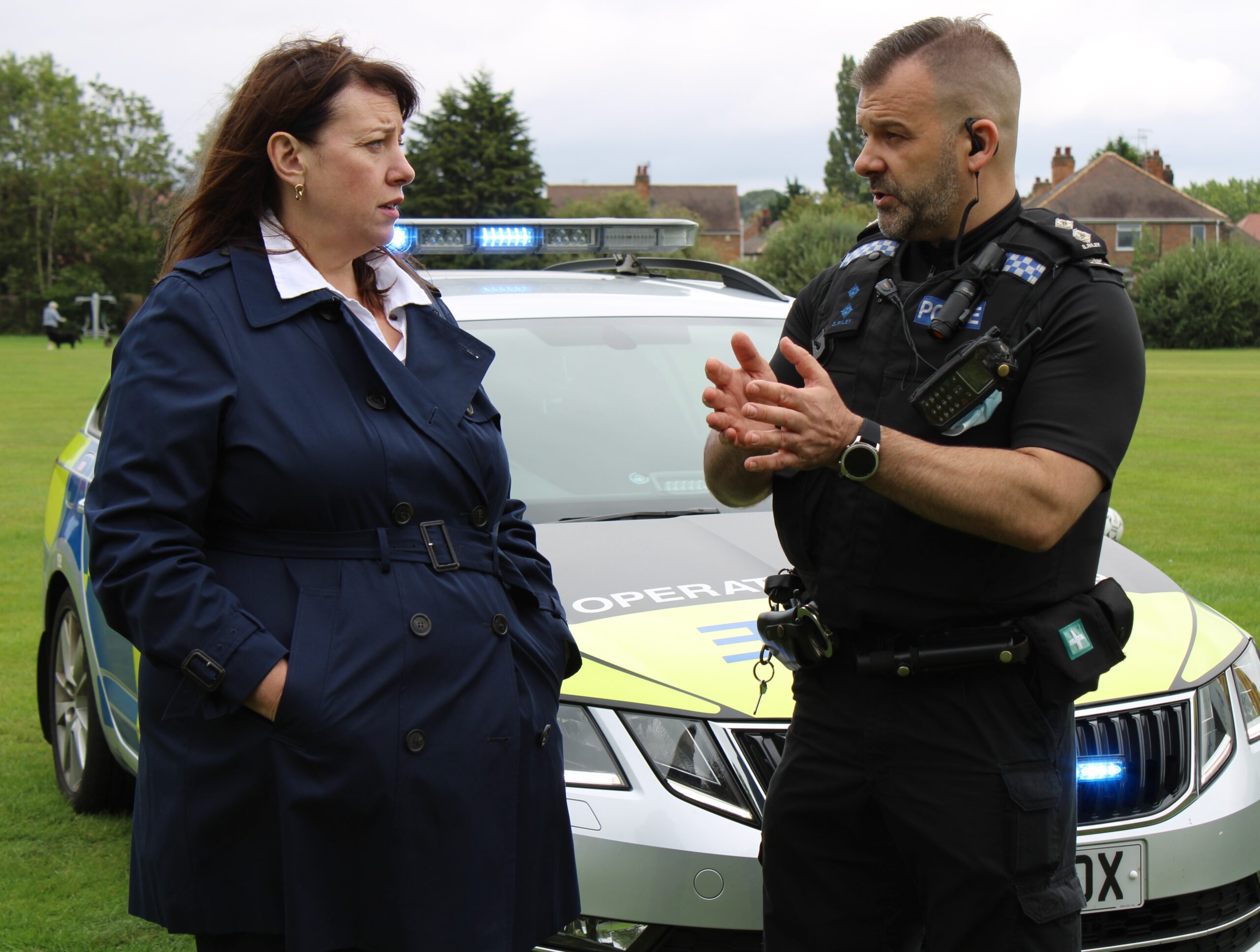 Caroline Henry, Nottinghamshire Police and Crime Commissioner talking to a police officer