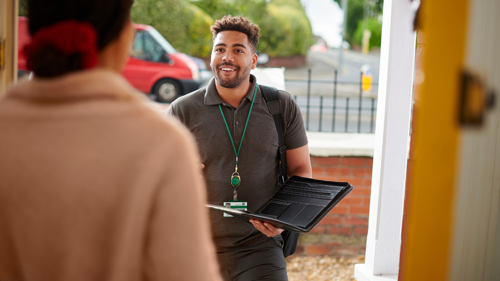 Smiling Social Worker at the door in North Yorkshire