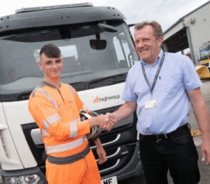 NY Highways workers shaking hands in front of LGV