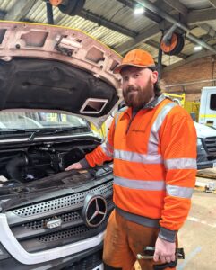 Jamie Keech - Apprentice of the Year working on a vehicle in NY Highways