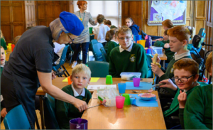 Children at Welburn Hall School eating lunch