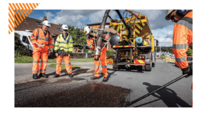 Highways Operative tarmaccing road